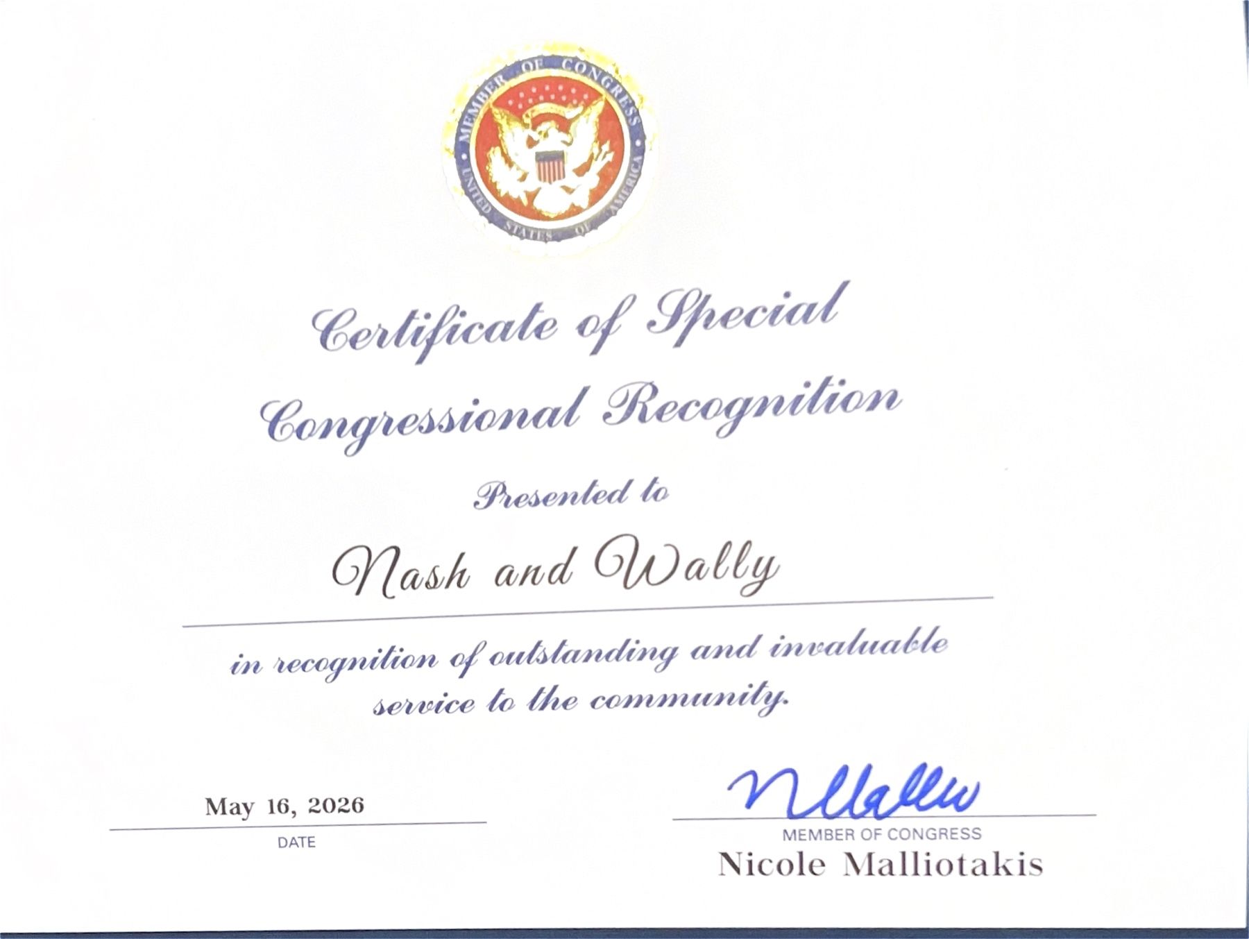 Photograph of the Special Congressional Recognition certificate presented to Nash and Wally.